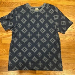 Faherty T-shirt. Size LARGE. Navy Blue with western pattern